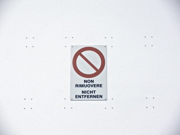 Wall plugs, readymade 'Do Not Remove' sign, wall